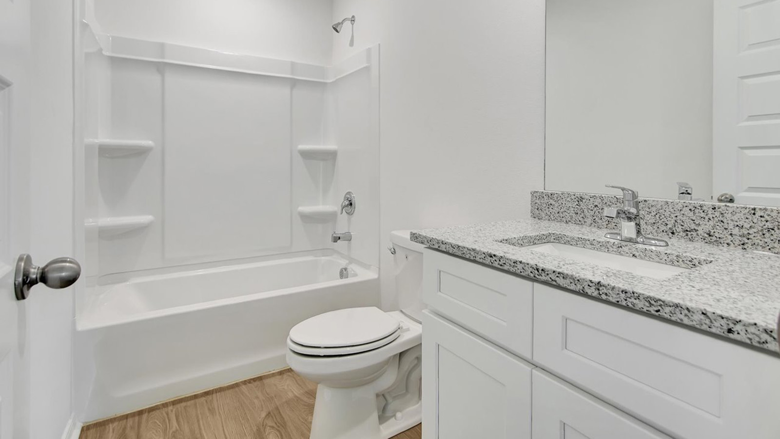 Guest bathroom with tub shower combo