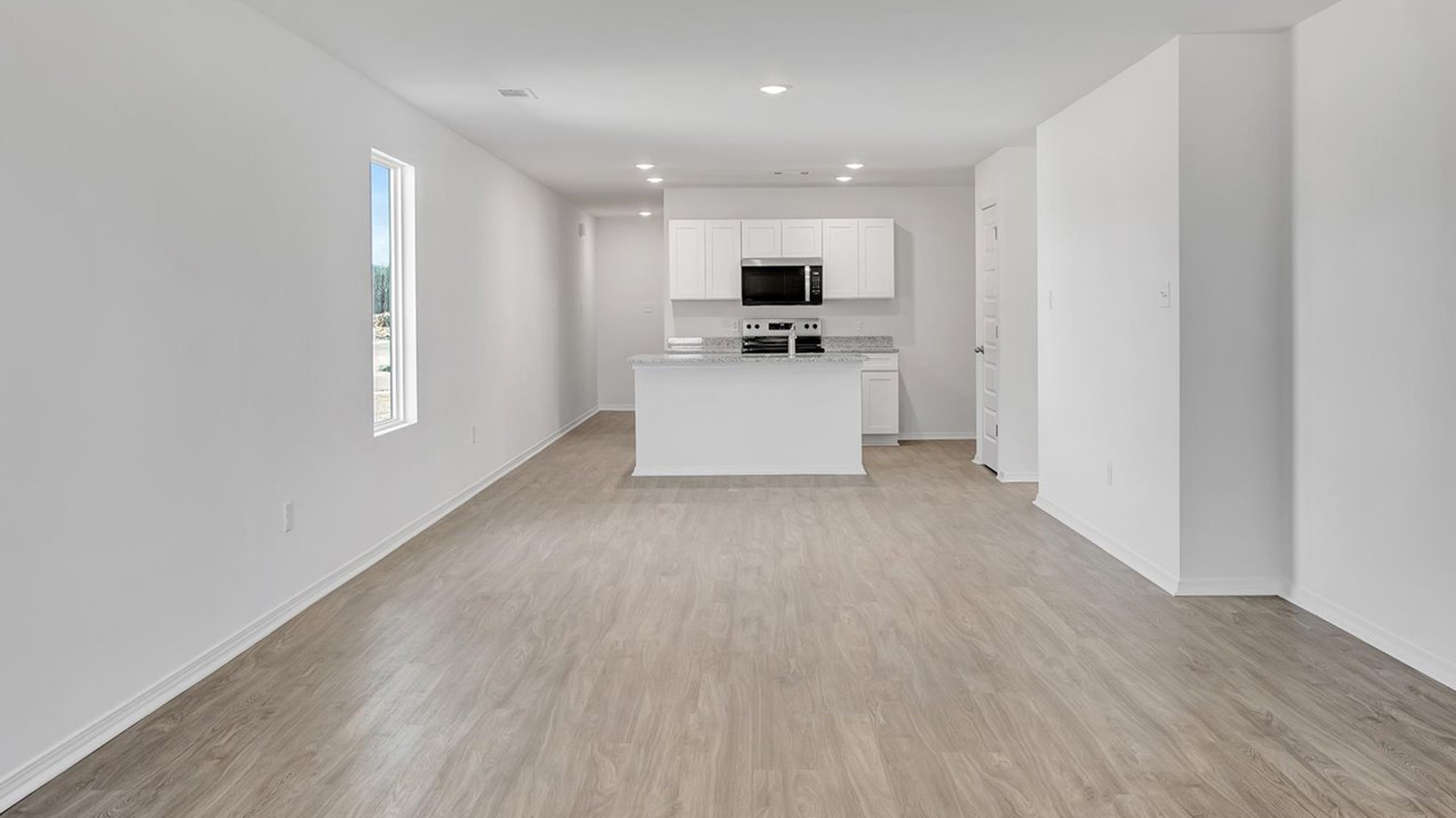 Kitchen open to living area