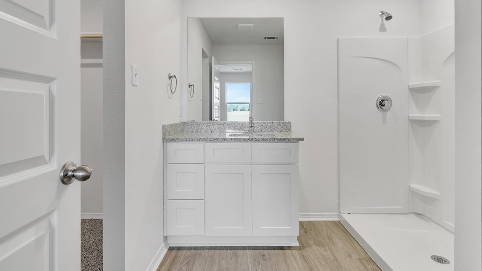Bathroom 1 with vanity and shower