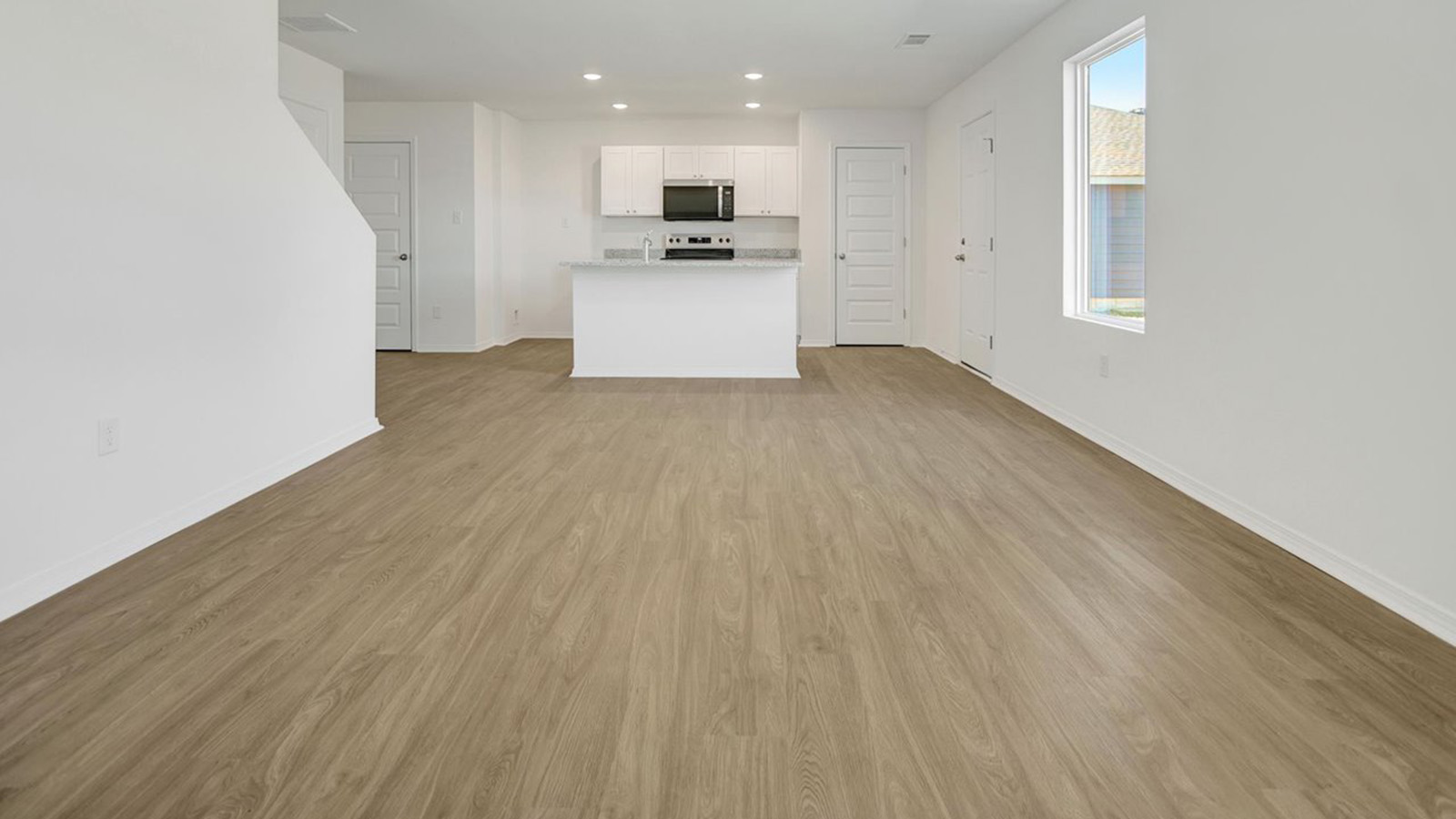 Living area open to kitchen with island
