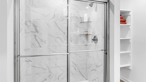 Bathroom 1 with shower and built in shelves