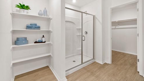 bathroom 1 with shower and shelves