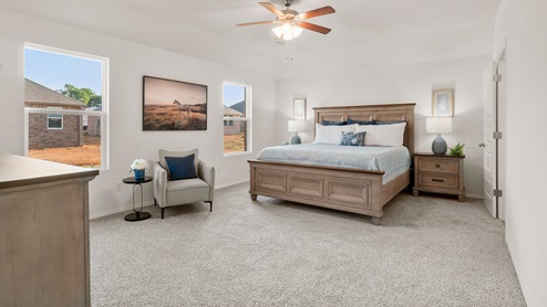 bedroom with bed and windows