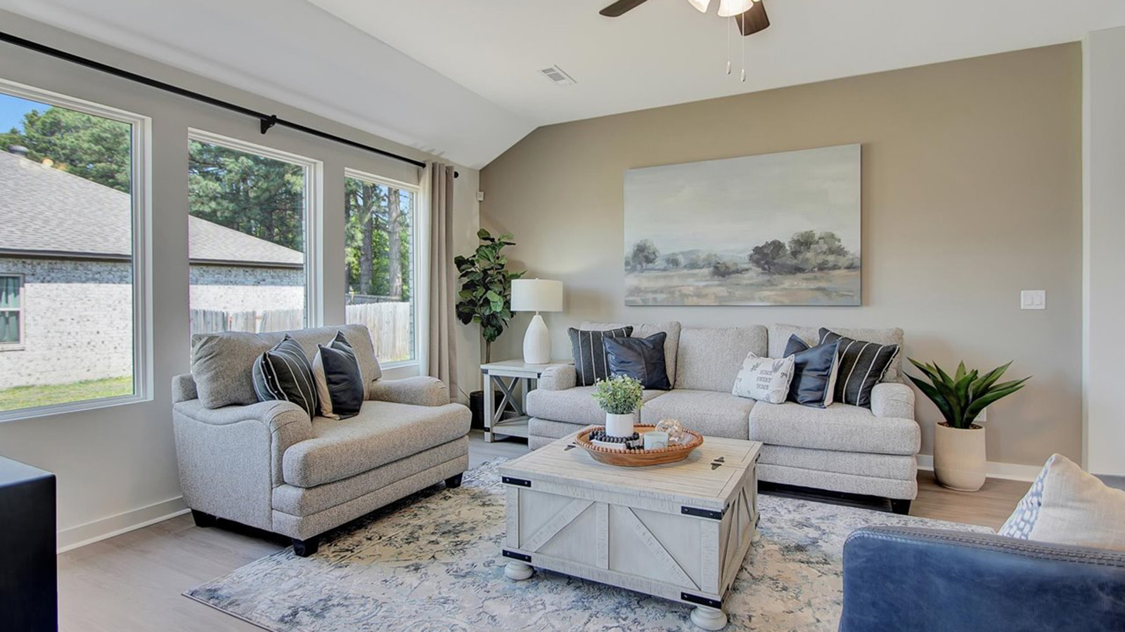 Living area with sofas and chair
