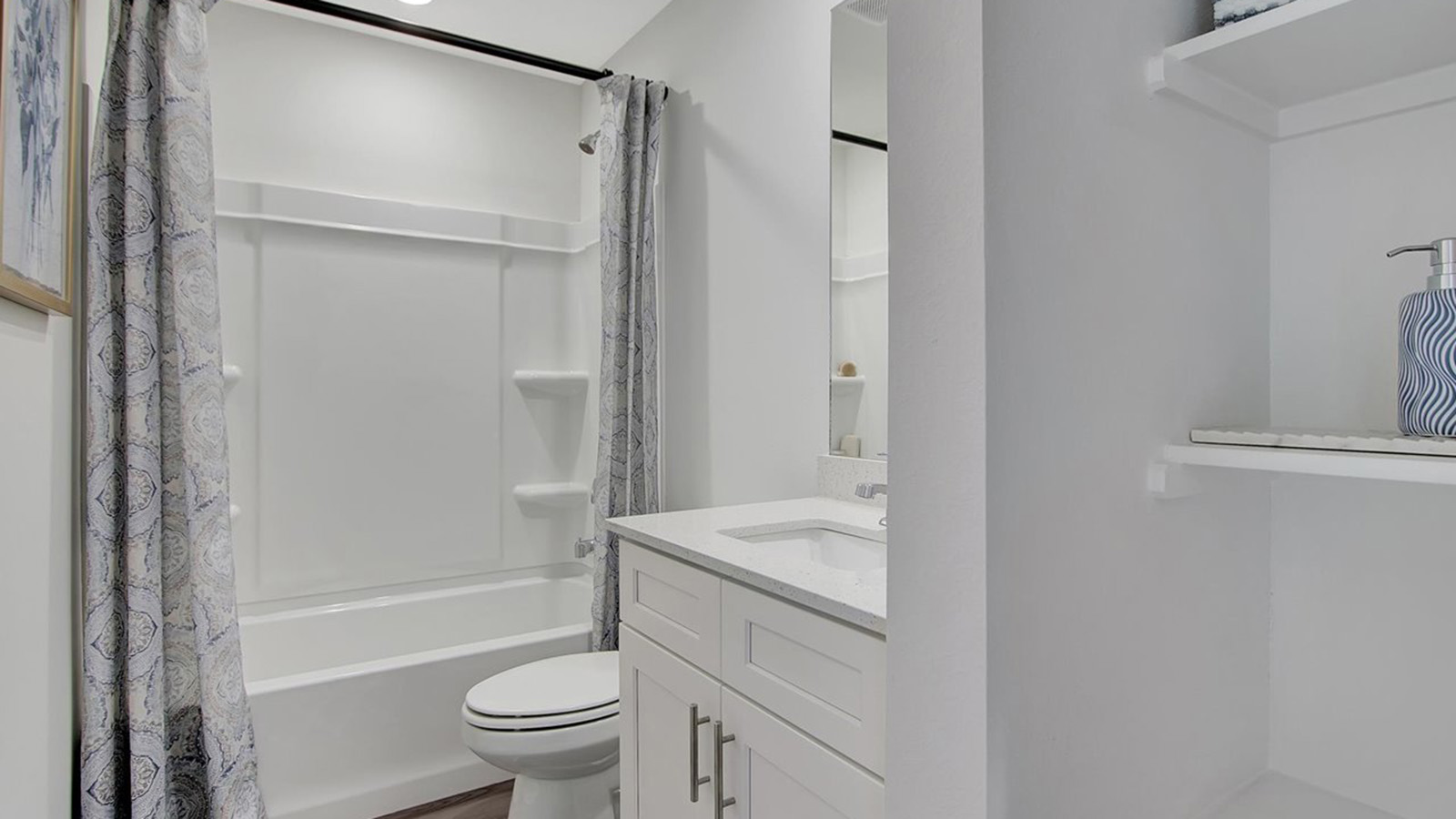 Bathroom 2 with tub and vanity