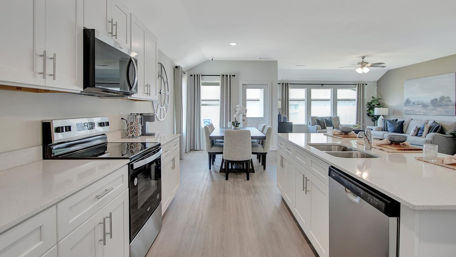 kitchen with island and white cabinets