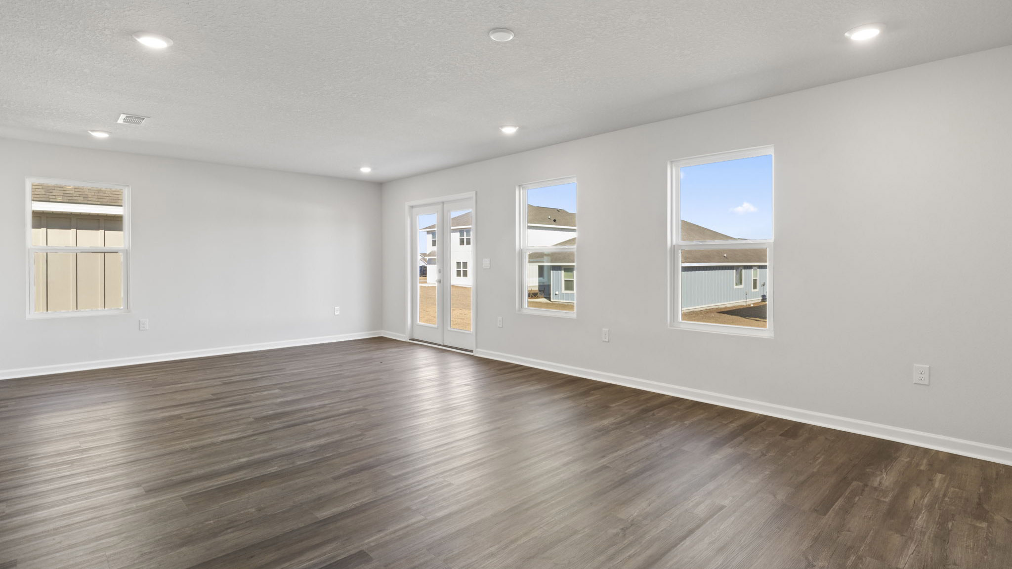 The Lismore Floorplan living room with EVP flooring throughout