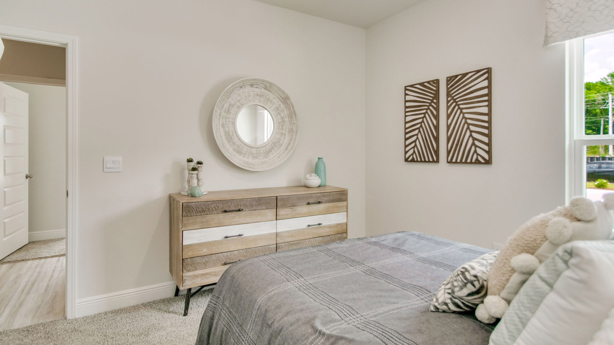 The Beau floorplan guest bedroom two with carpet throughout