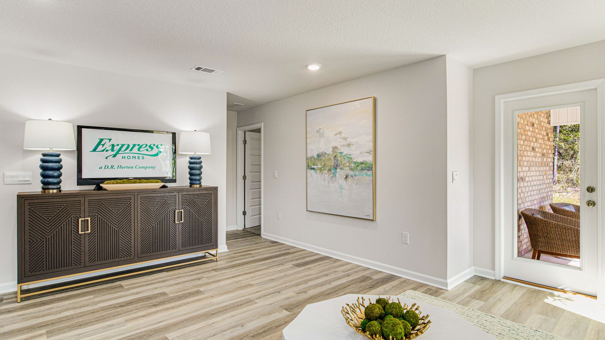 The Lakeside floorplan living room with EVP flooring throughout