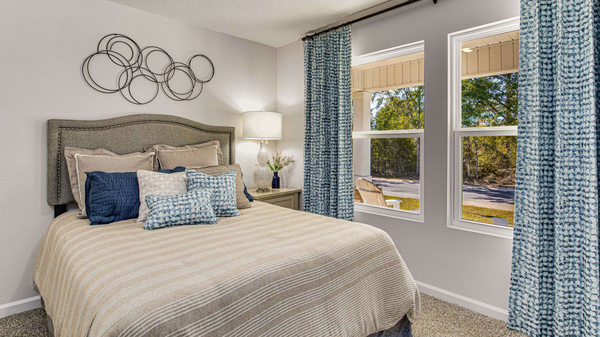 The Lakeside floorplan guest bedroom three with window view