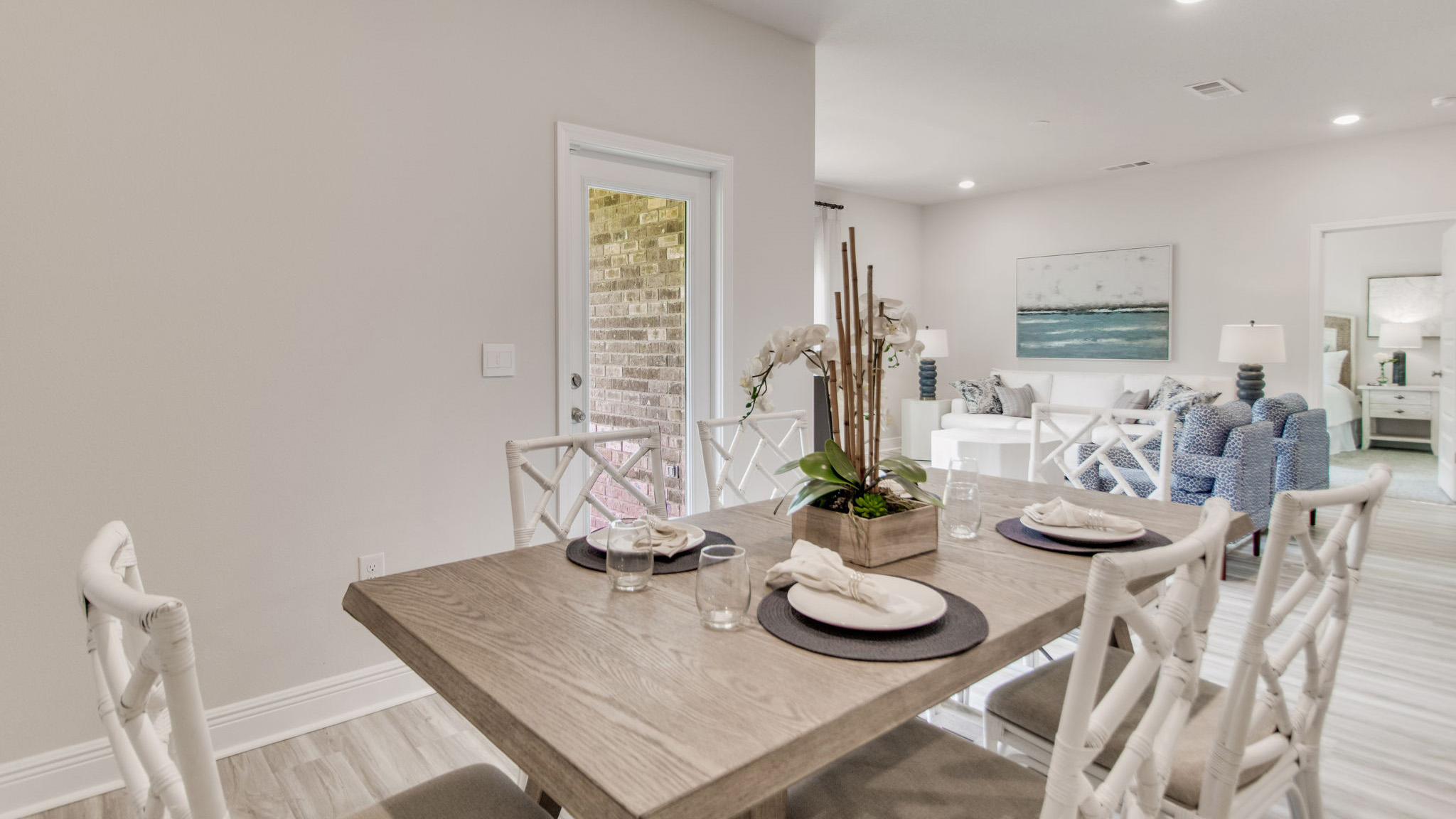 The Beau floorplan dining room with EVP flooring throughout