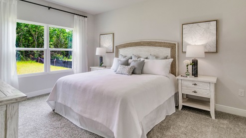 The Beau floorplan primary bedroom with large window