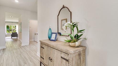 The Beau floorplan entryway with EVP flooring throughout