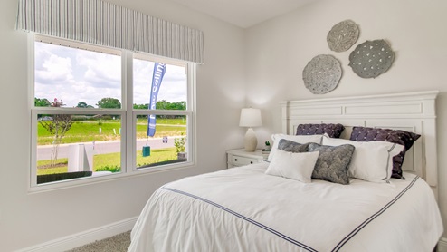 The Beau floorplan guest bedroom one with large window