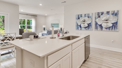 The Beau floorplan kitchen island with quartz countertops