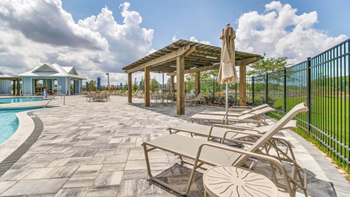 The Blackwater Reserve cabana with lounge chairs and shaded space