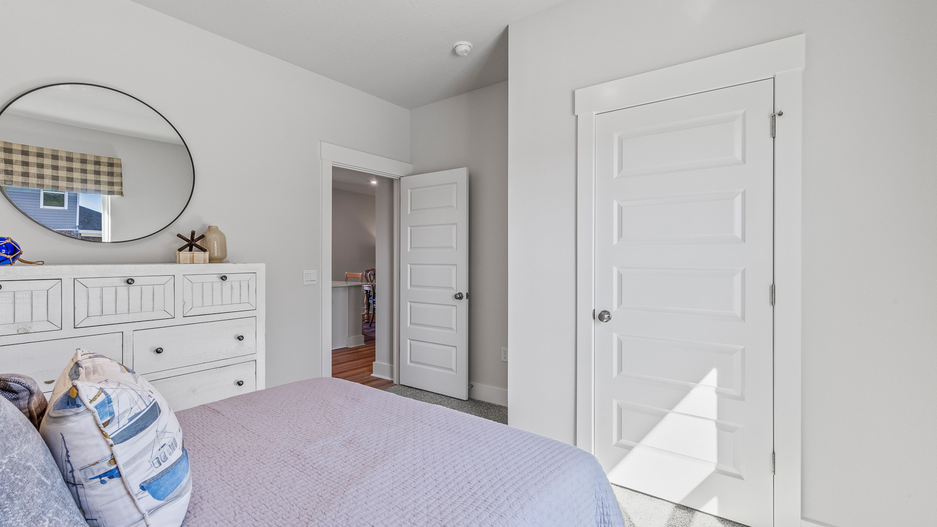 The Camilla Floorplan guest bedroom two with carpet throughout