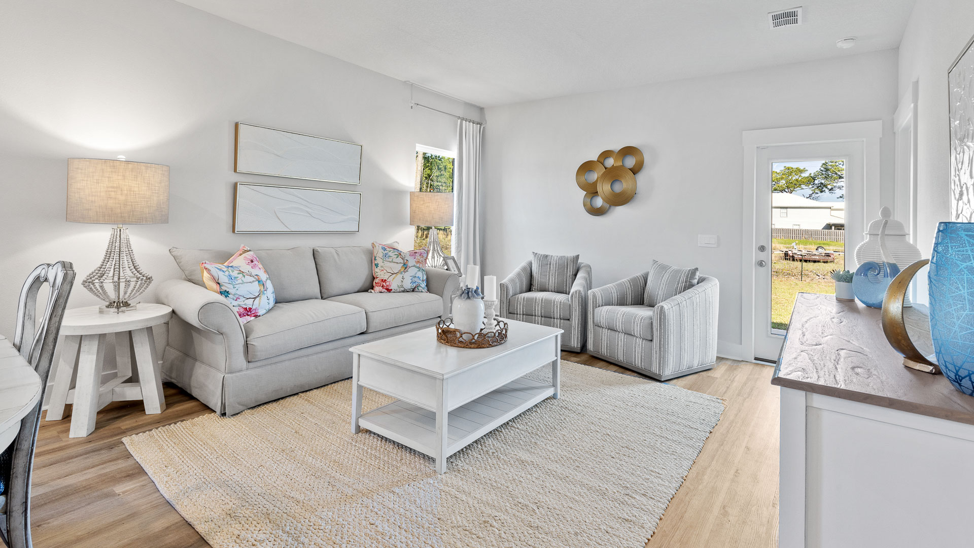 The Camilla living room with acess to the back porch