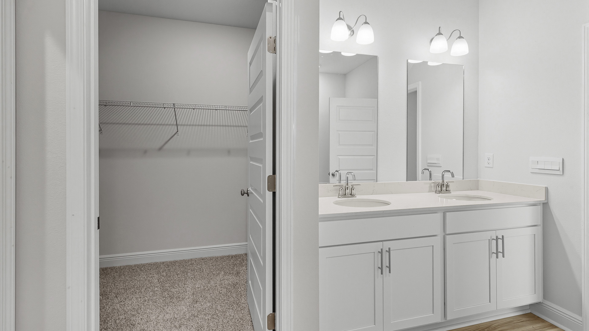 The Creekside floorplan primary bathroom with a dual vanity and quartz countertops