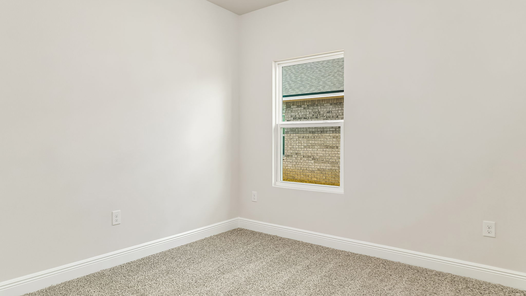 The Delilah guest bedroom one with carpet throughout