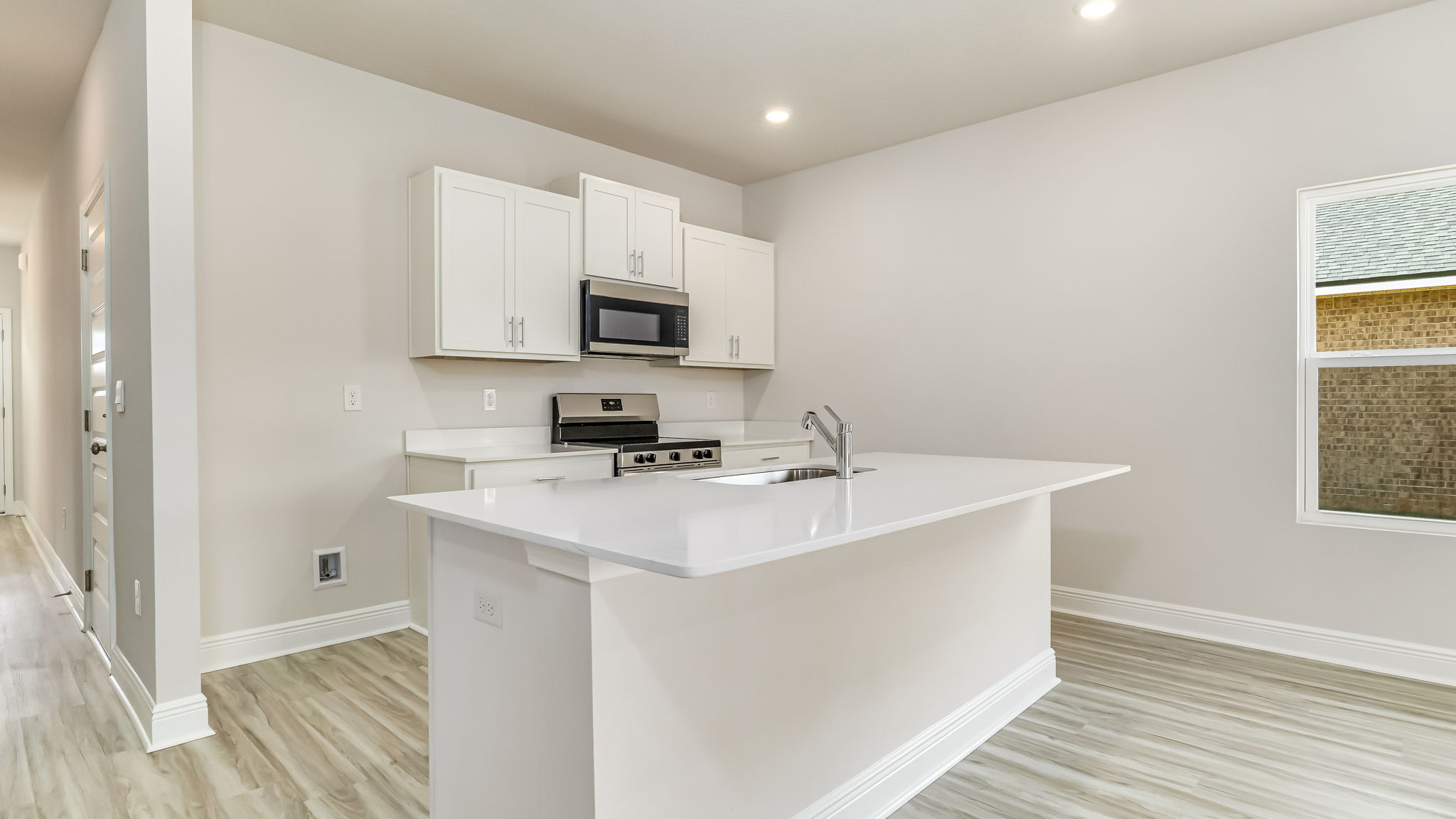 The Delilah kitchen with white shaker style cabinets