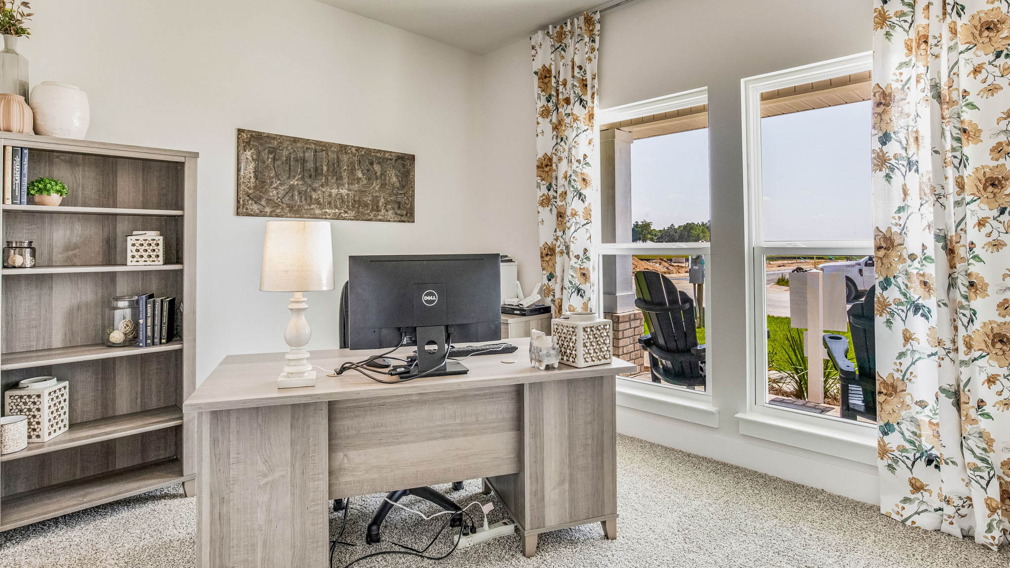The Riverside floorplan guest bedroom one with large window
