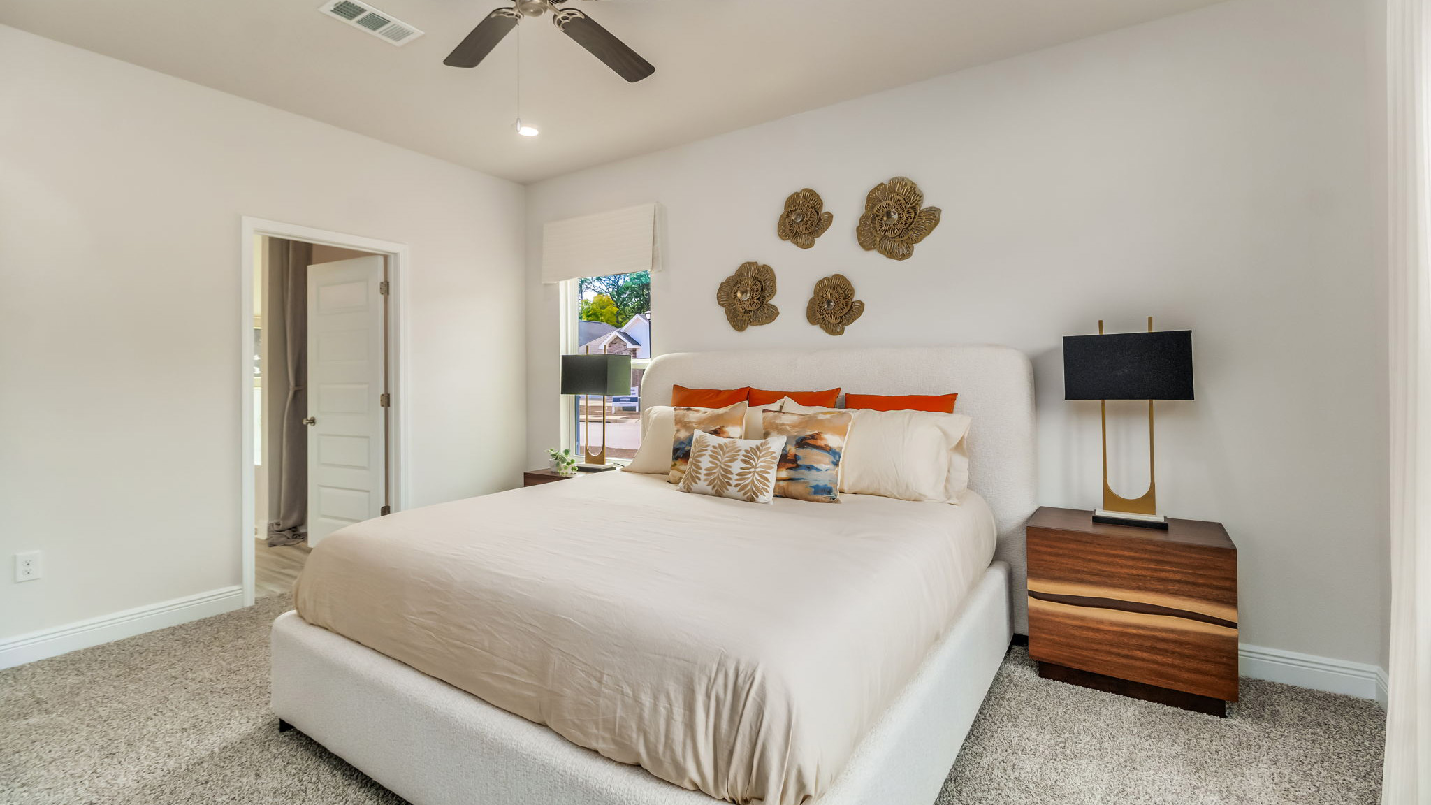 The Belfort floorplan primary bedroom with carpet throughout and 9 foot ceilings