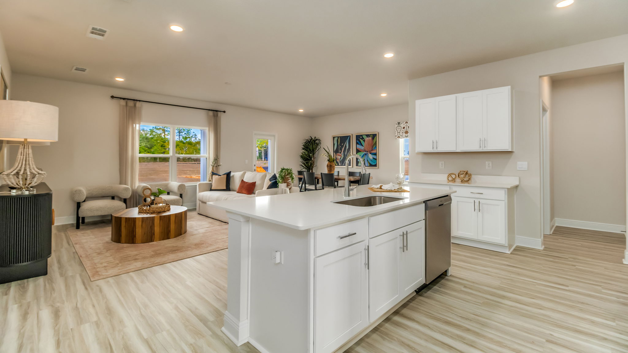 The Belfort floorplan main living space eith EVP flooring throughout