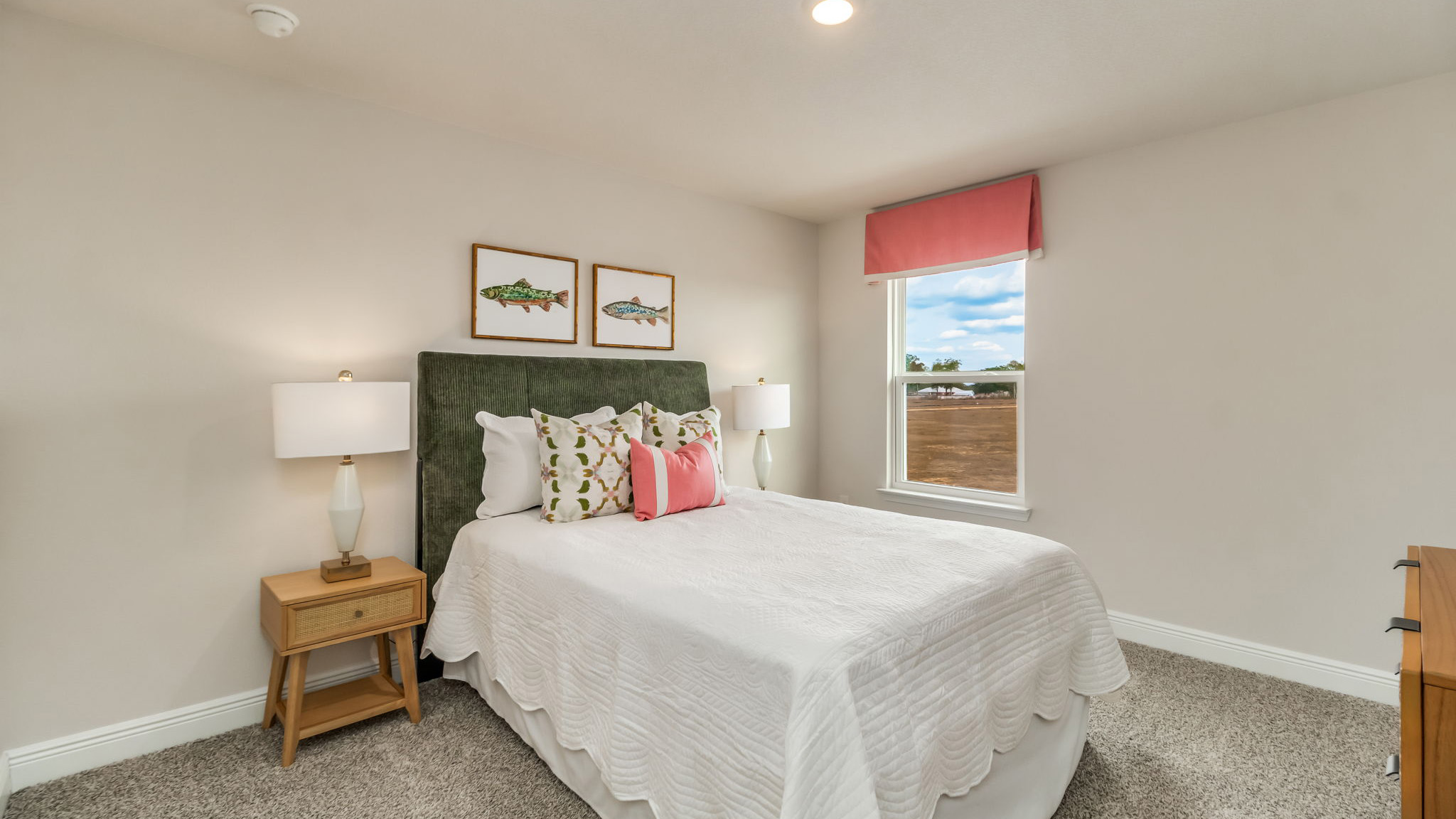 The Belfort floorplan guest bedroom two with one window and carpet throughout