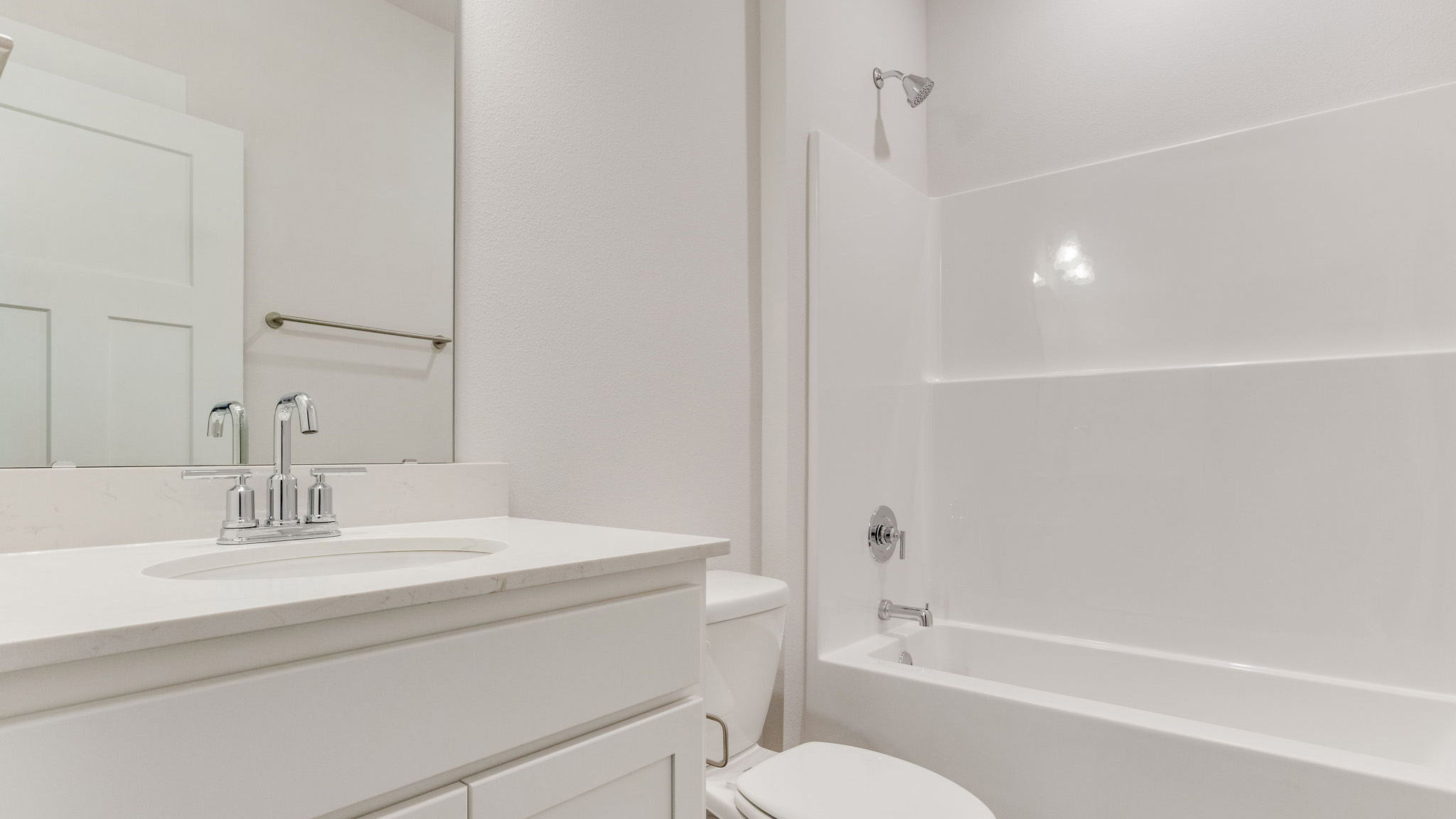 The Lamar floorplan guest bathroom with single vanity and quartz countertops