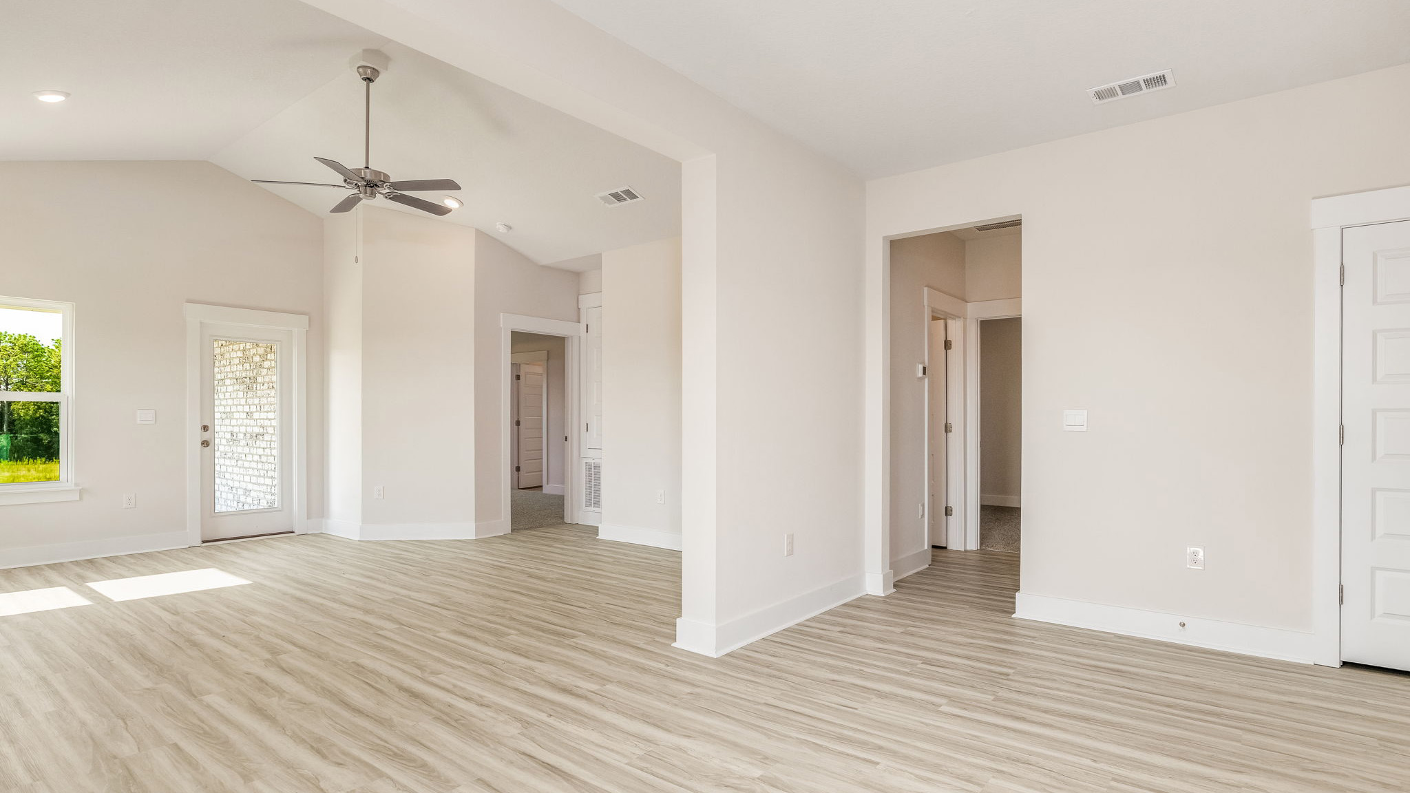 The Oakley floorplan living room with vaulted ceilings