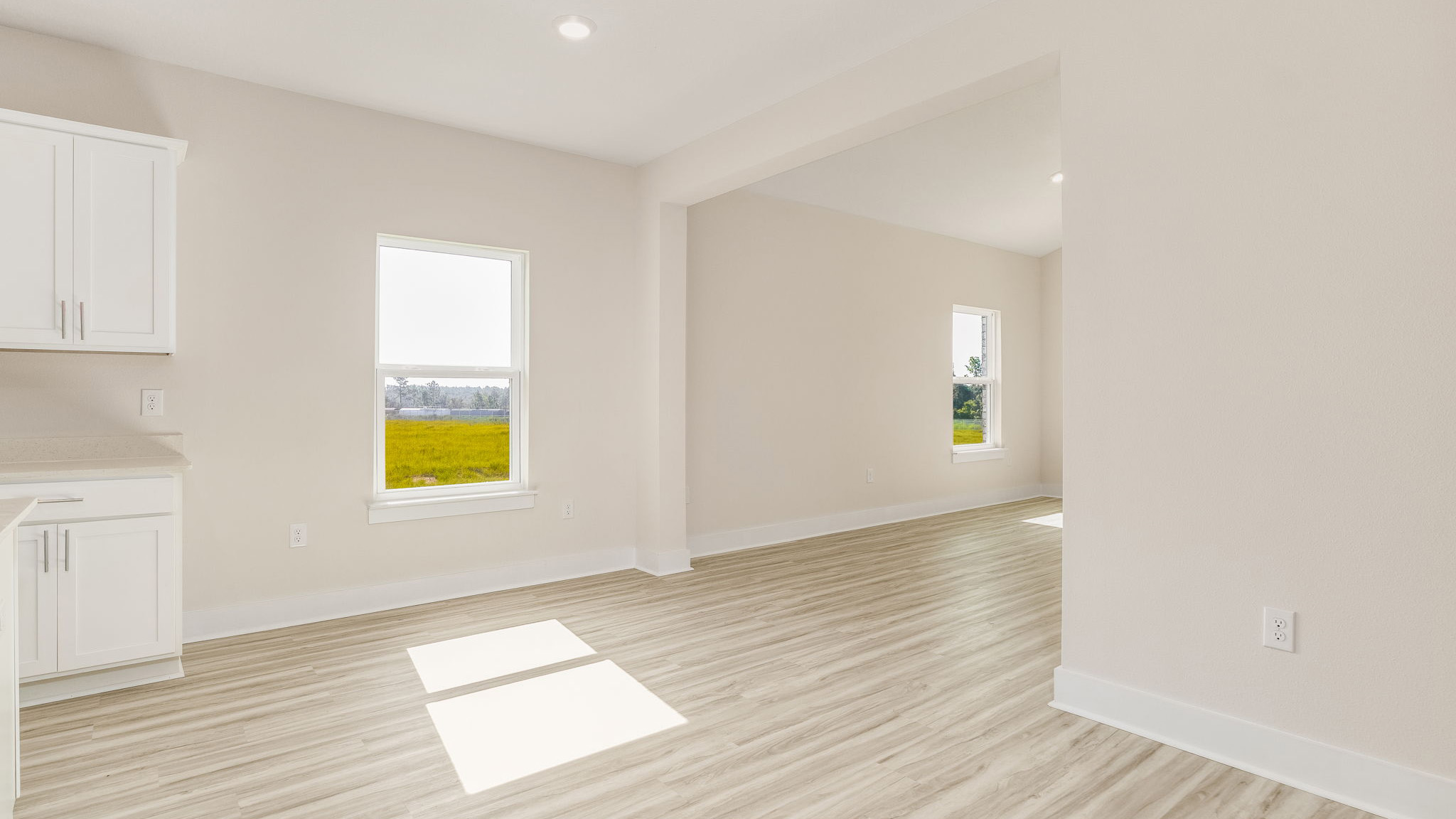 The Oakley floorplan dining room with LVP flooring throughout