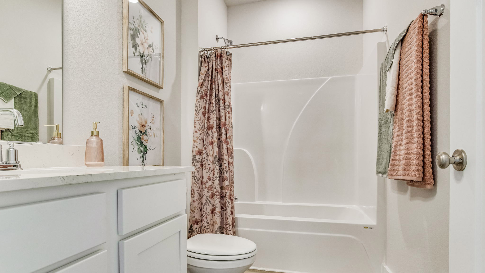 The Rhett floorplan guest bathroom with single vanity and quartz countertops