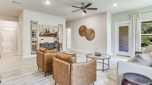 The Riverside floorplan open concept living room with EVP flooring throughout