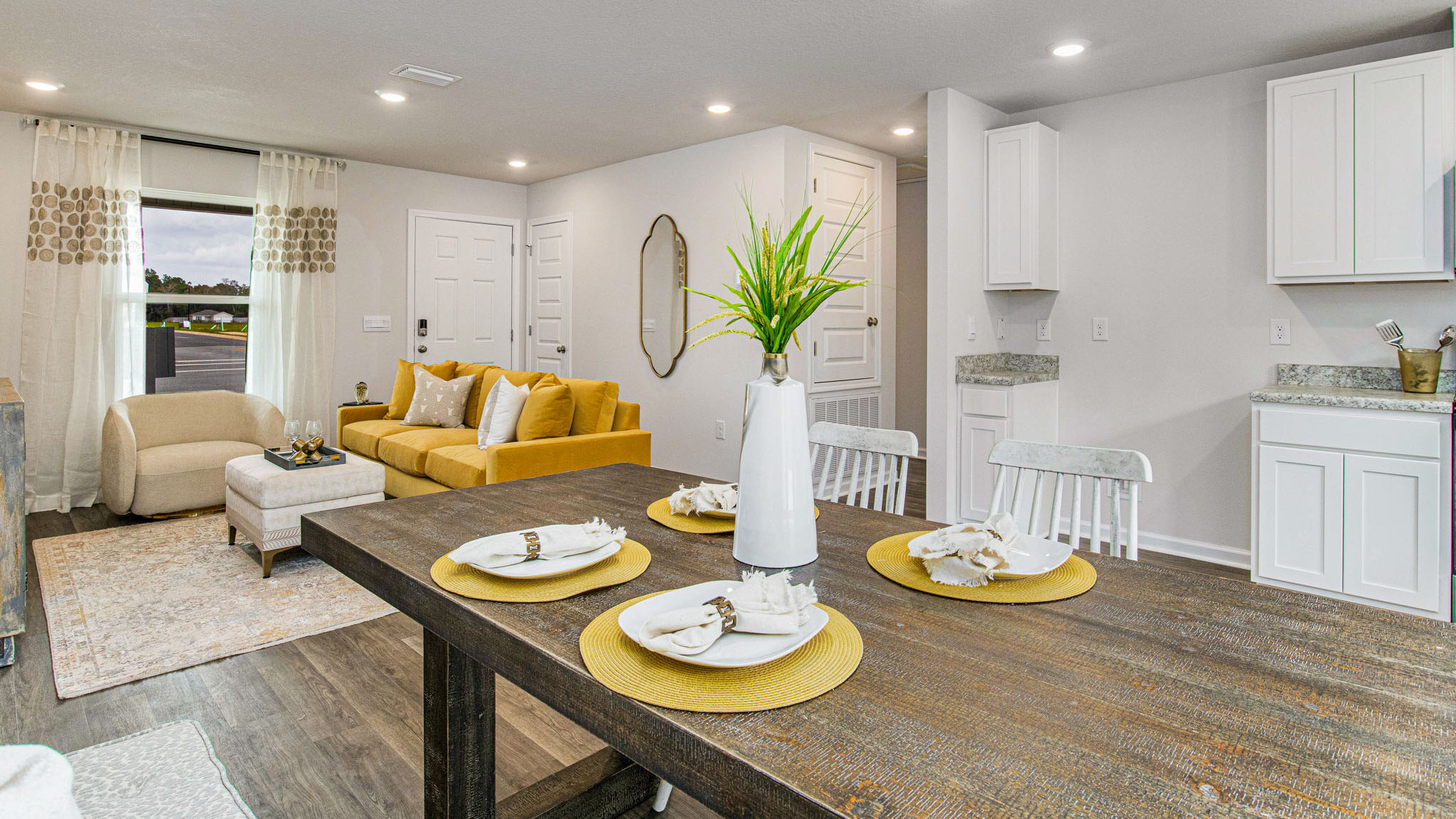 The Allanton floorplan open concept living, dining and kitchen space