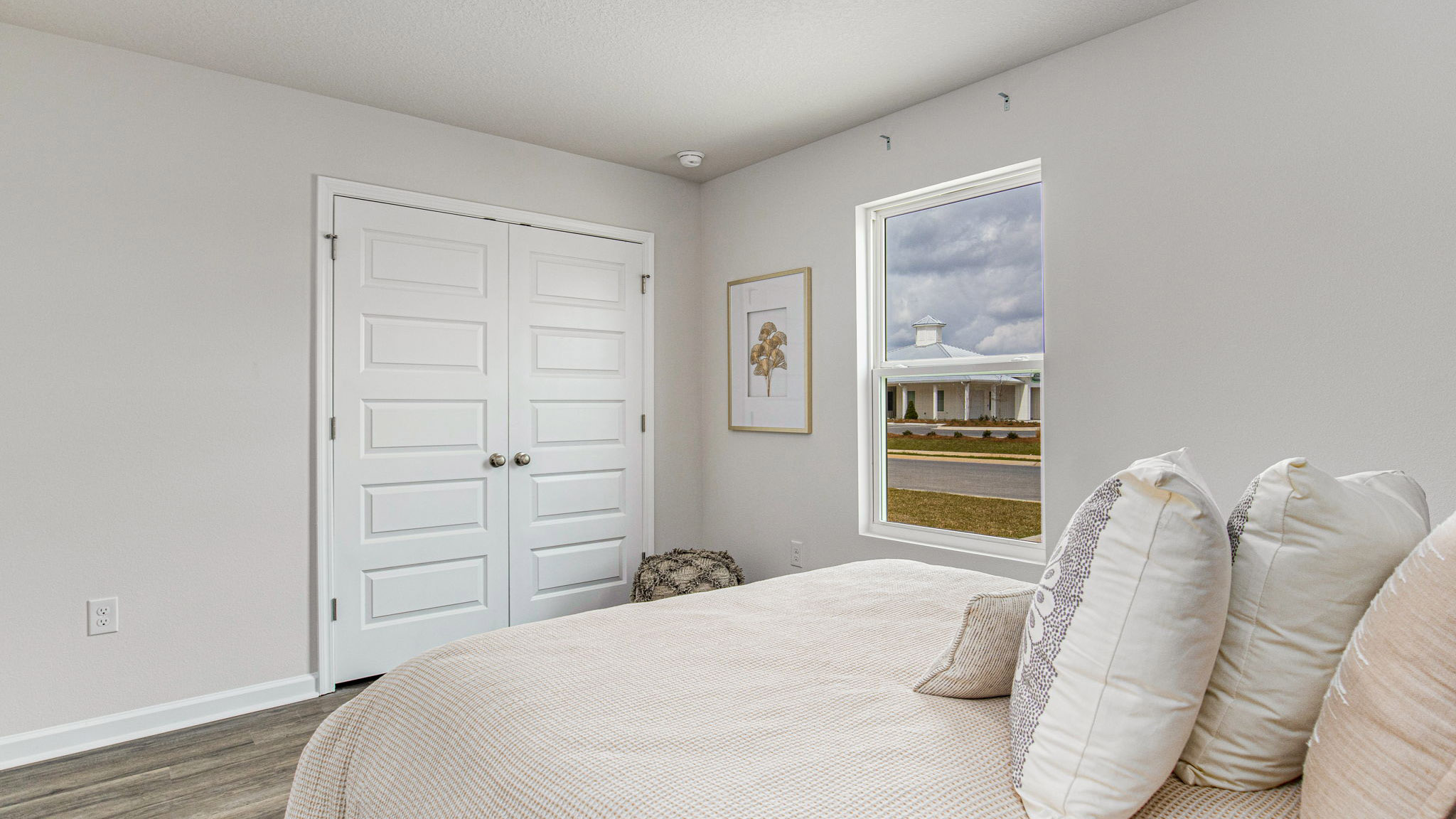 The Allanton guest bedroom with EVP flooring throughout