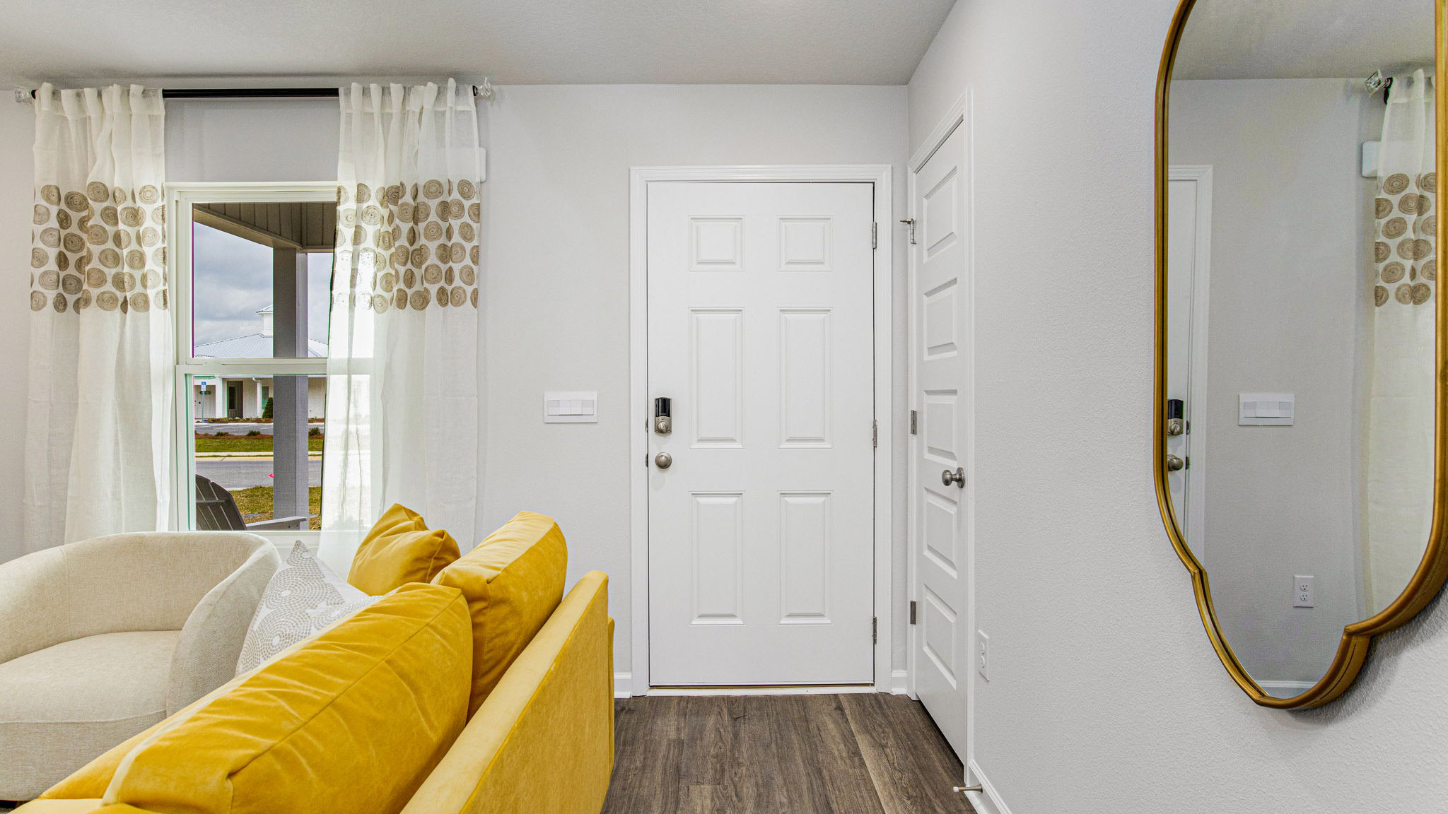 The Allanton floorplan entry way with EVP flooring