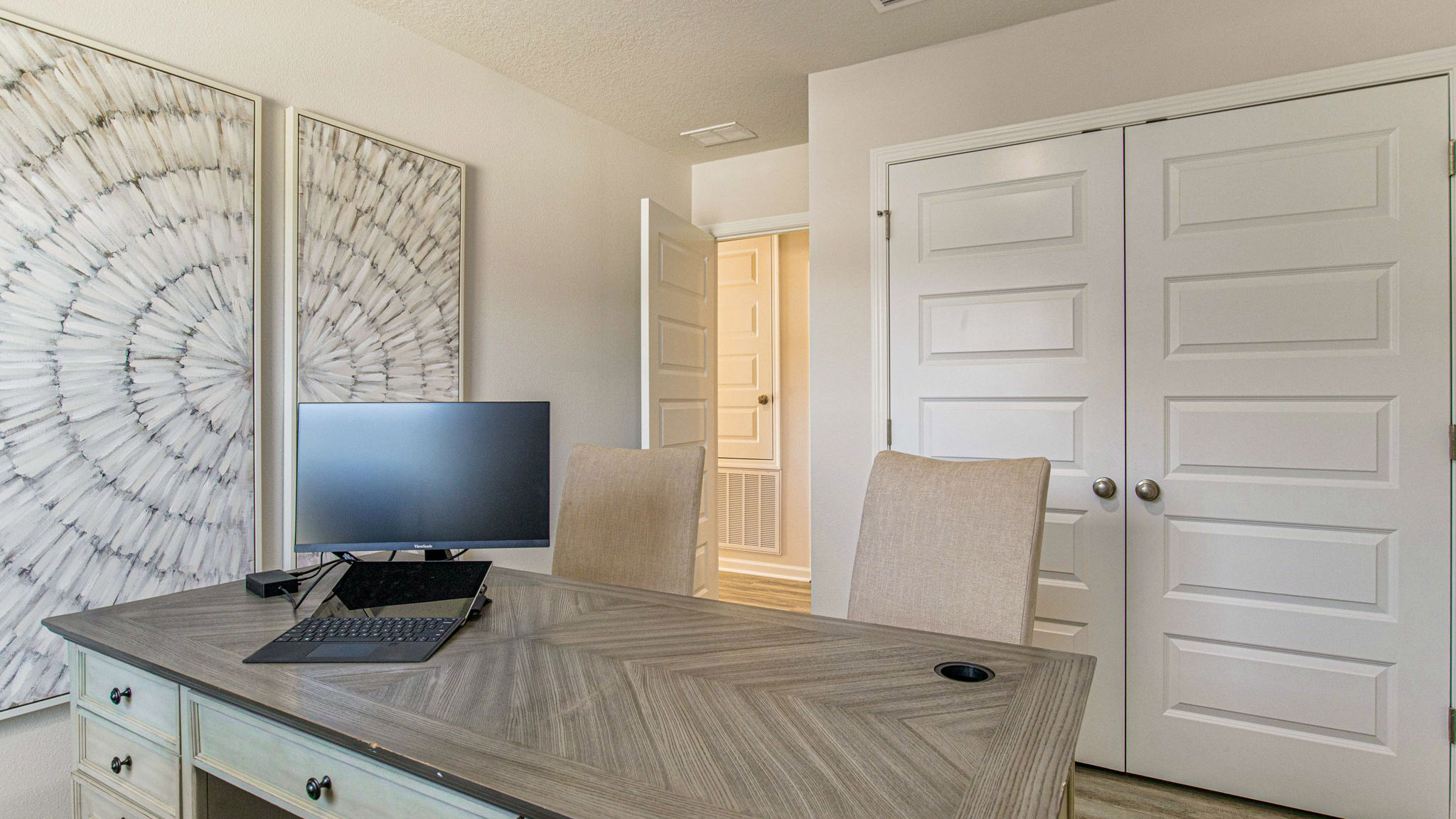 The Callaway floorplan guest bedroom two with EVP flooring throughout