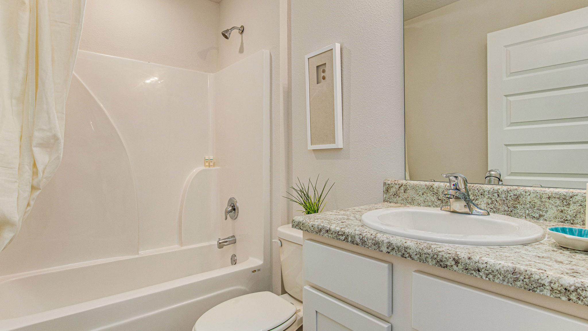 The Callaway floorplan guest bathroom with shower tub combo and single vanity