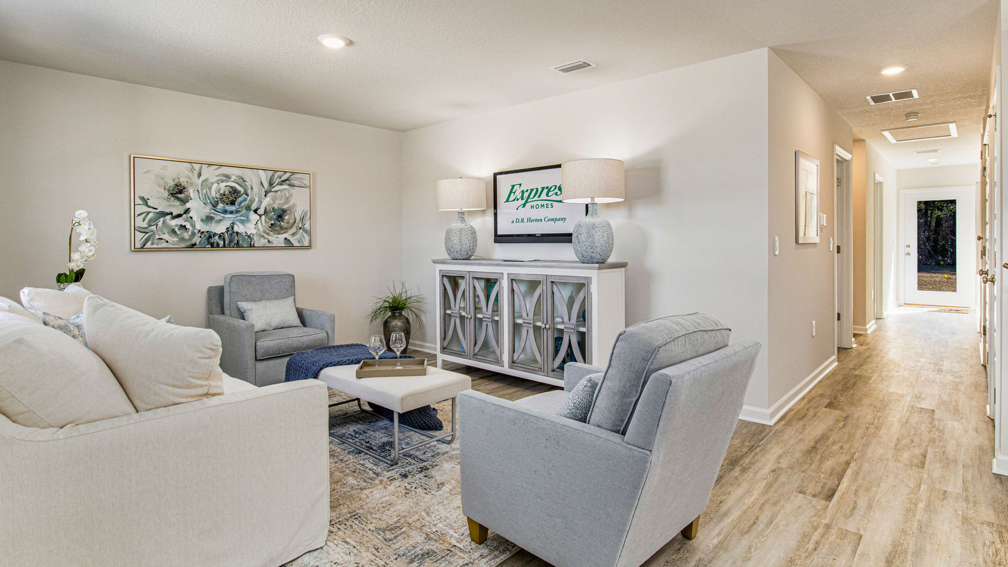 The Callaway floorplan living room with EVP flooring throughout