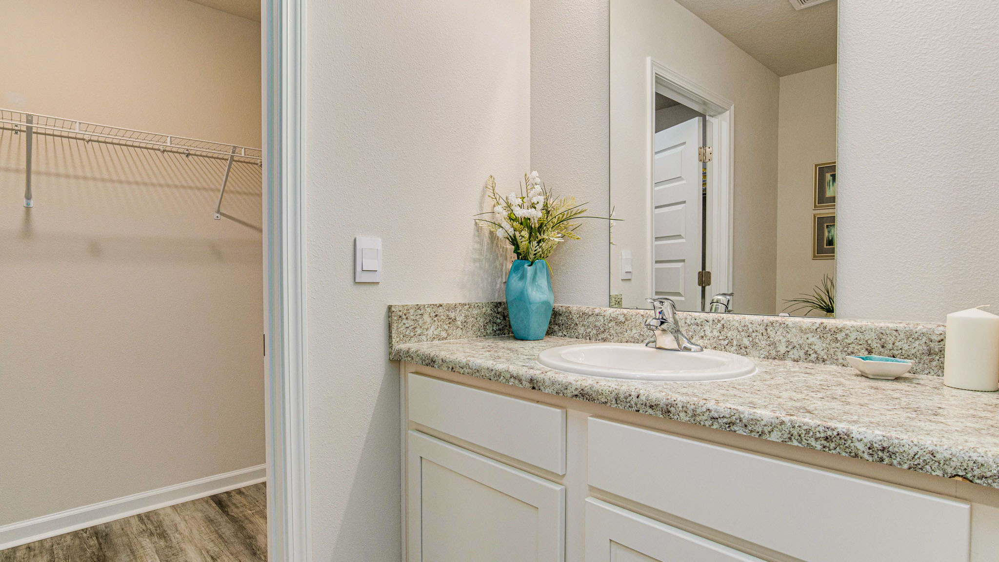 The Callaway floorplan primary bathroom single vanity with Formica countertops