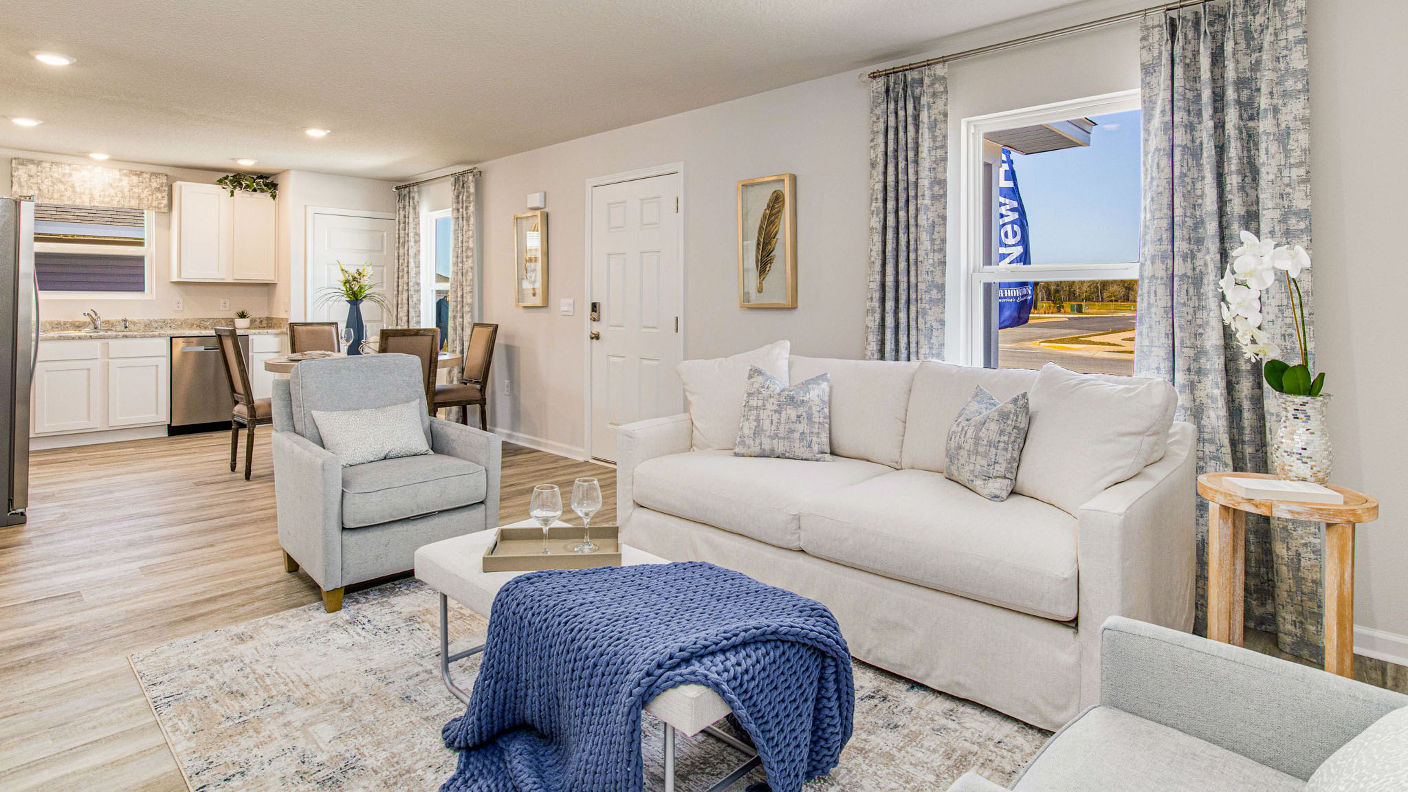 The Callaway floorplan open concept living, dining and kitchen space