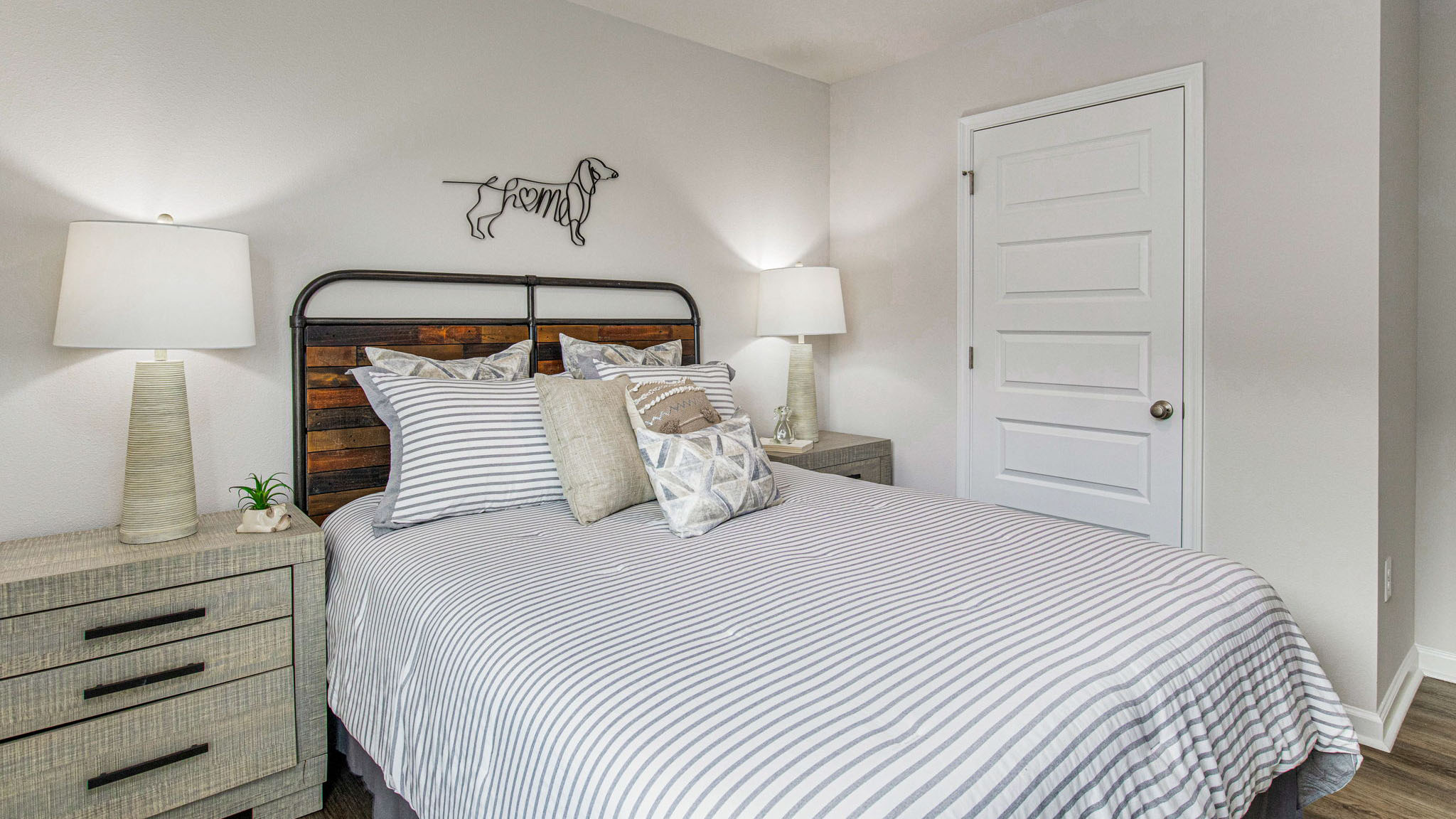 The Sullivan guest bedroom one with EVP flooring throughout