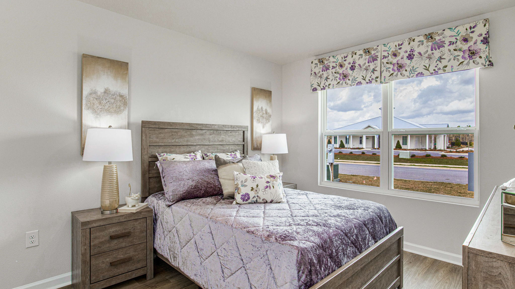 The Sullivan guest bedroom three with large window