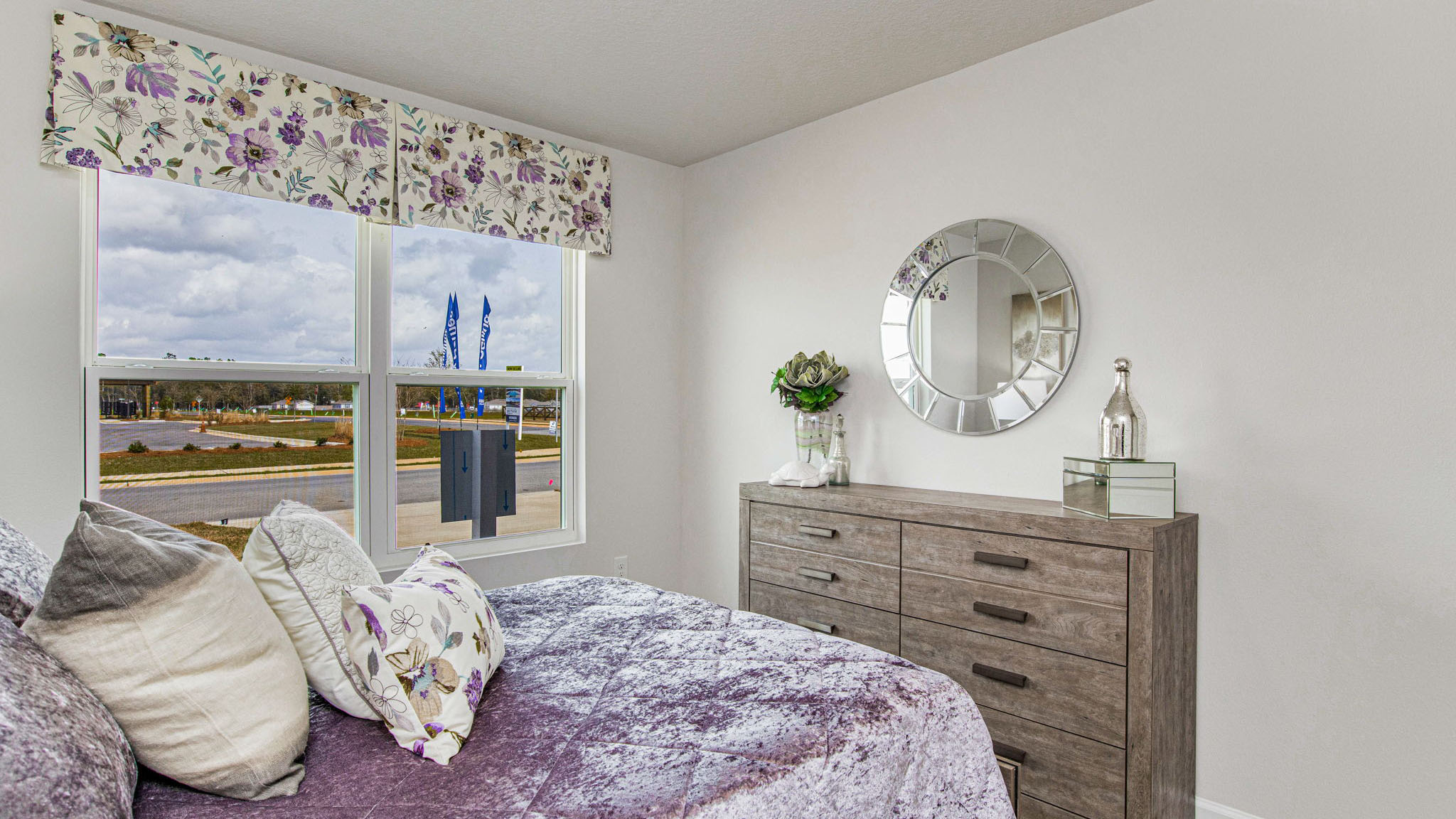 The Sullivan guest bedroom three with EVP flooring throughout