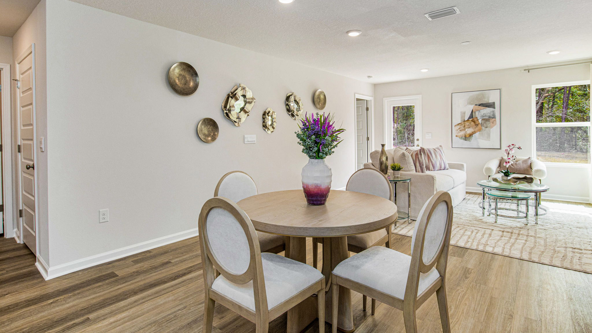The Sullivan floorplan dining space with EVP flooring throughout