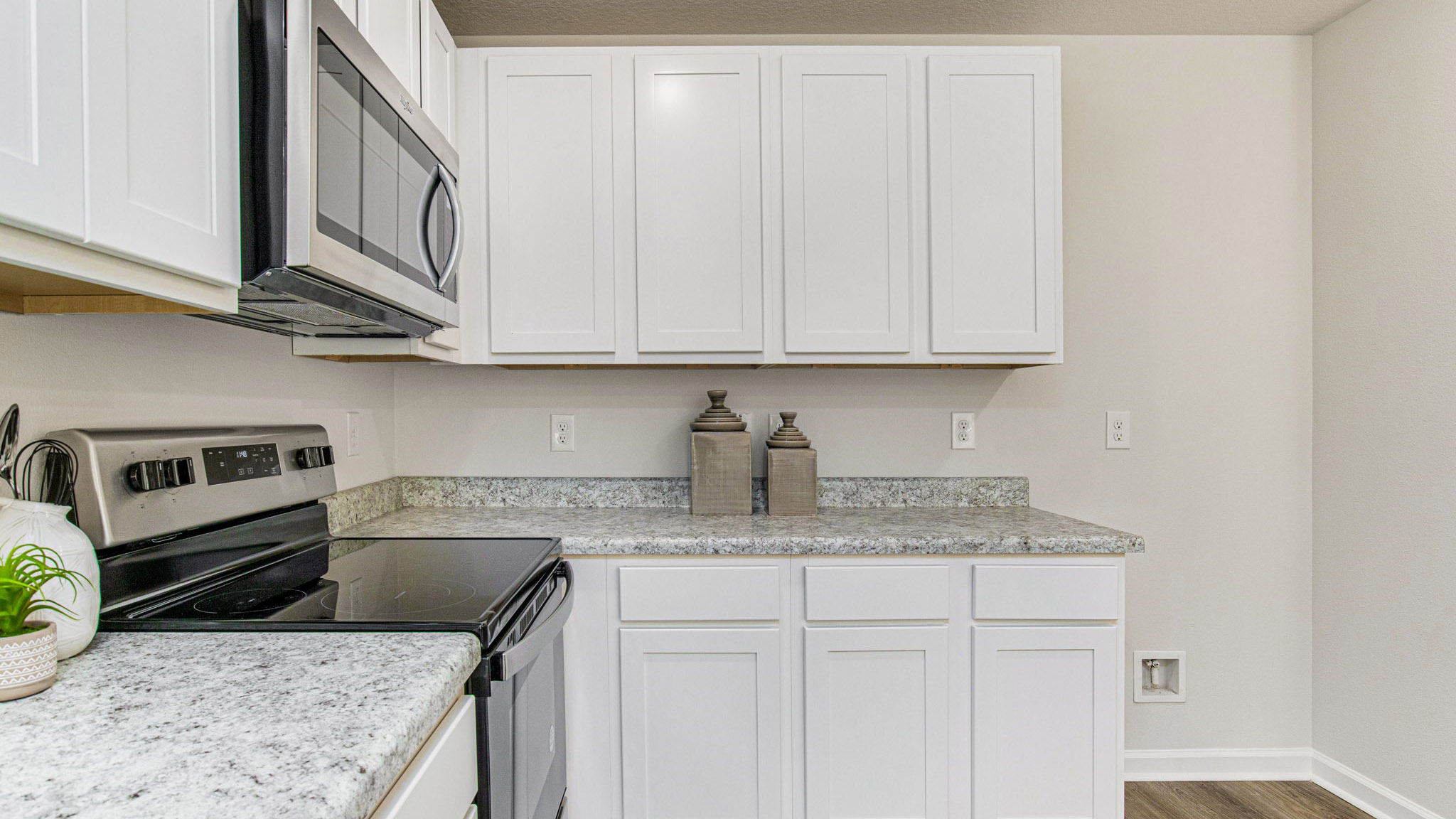 The Sullivan floorplan kitchen with stainless steel appliances