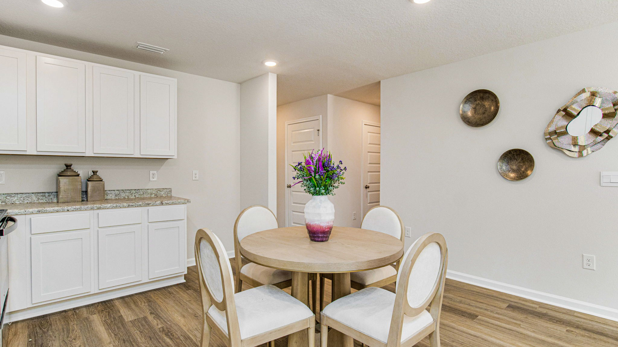 The Sullivan floorplan dining space with EVP flooring throughout