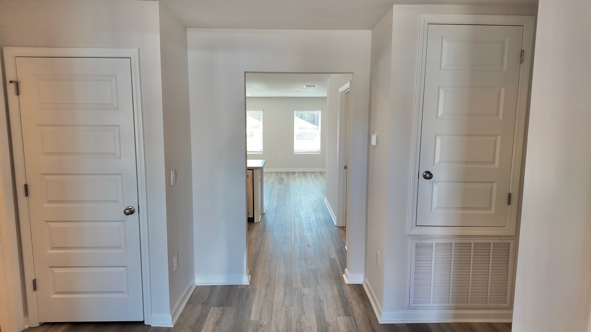 The Lismore floorplan entry way with EVP flooring throughout