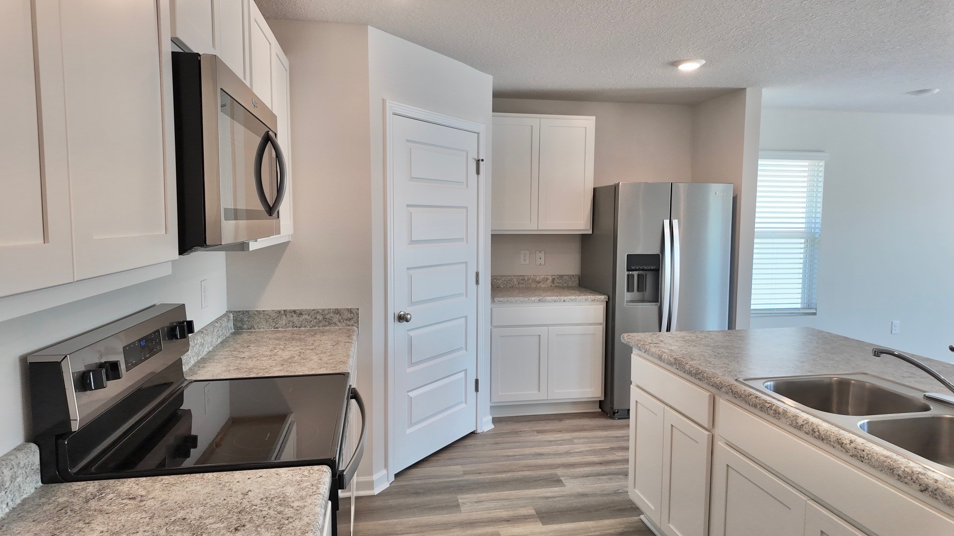 The Lismore floorplan kitchen island with Formica countertops